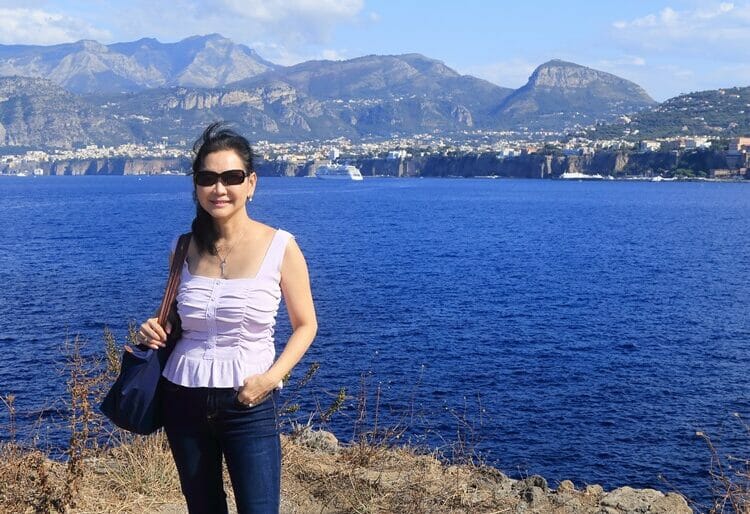 Mum with Sorrento in the backdrop in Italy