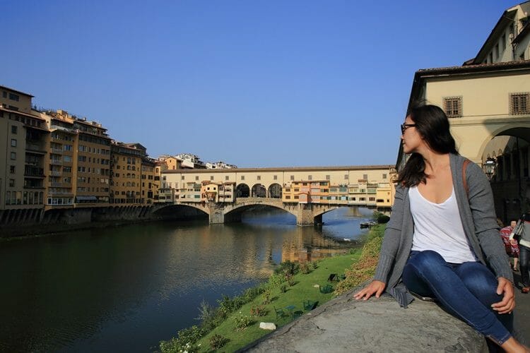 Woman with Ponte Vecchio in Florence in the background