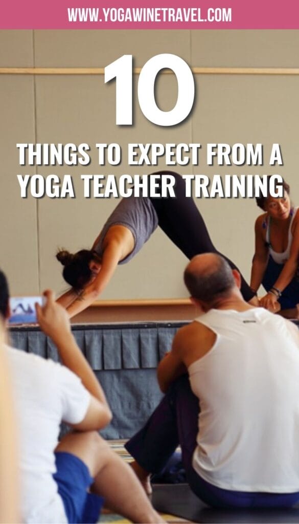 Yoga teacher and student demonstrating downward facing dog