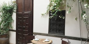 Doorway and table in a riad in Marrakech Morocco
