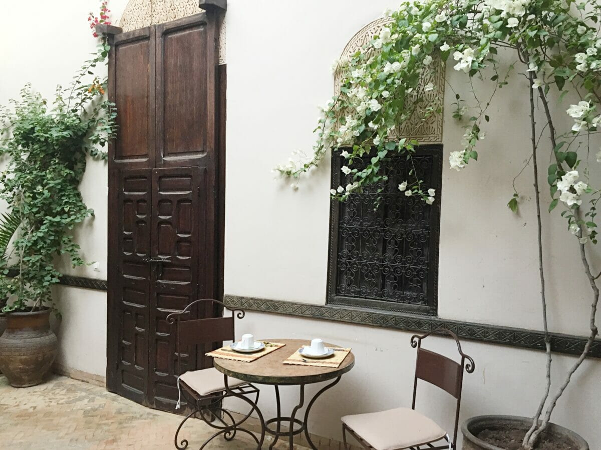Doorway and table in a riad in Marrakech Morocco