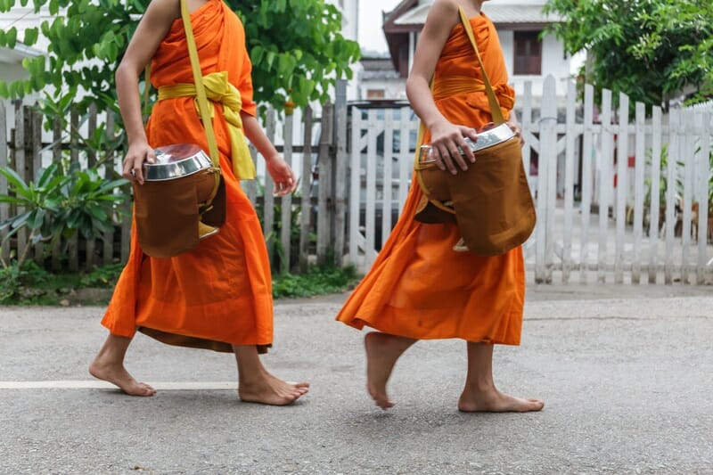 Buddhist monks on the street in Luang Prabang, Laos