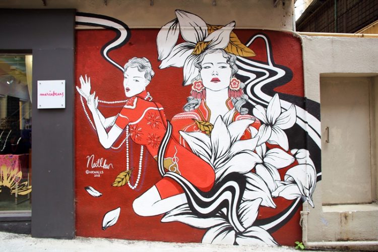 Red painted woman street art in Soho Hong Kong