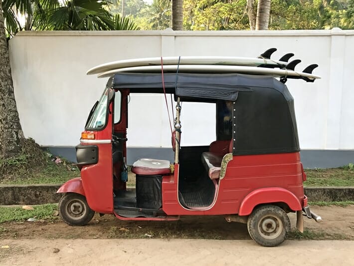 Surfboards on top of a tuk tuk in Sri Lanka