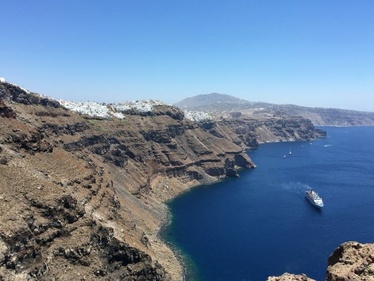 Cruise ship sailing in the caldera in Santorini Greece