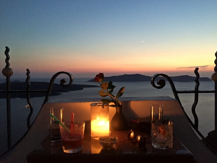 Sunset cocktails in Santorini Greece