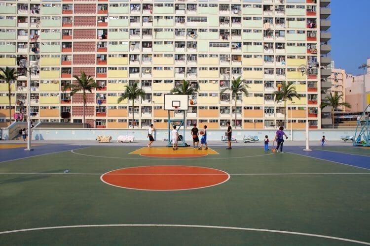 People playing basketball at Choi Hung Estate in Hong Kong