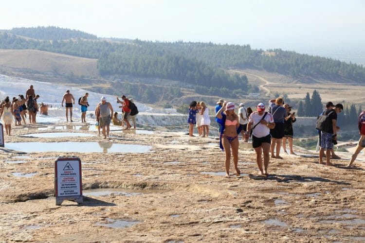 Tourists at Pamukkale Travertines in Turkey