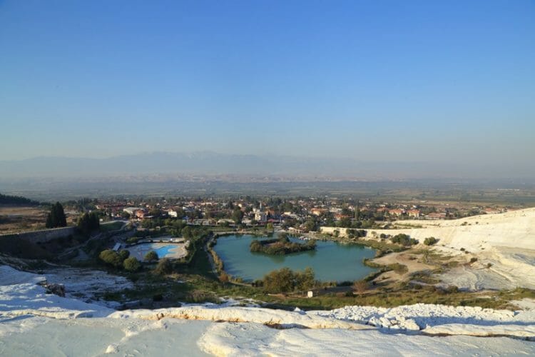 View of Pamukkale town from the travertines in Turkey