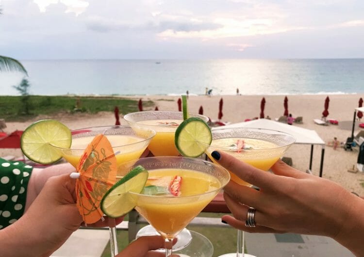 Sunset cocktails at XANA Beach Club in Phuket Thailand