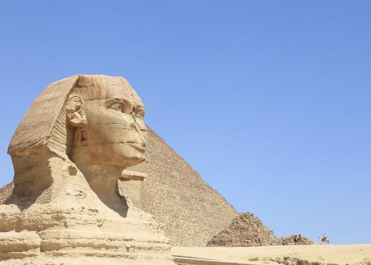 Great Sphinx of Giza in Cairo Egypt with pyramid in the background