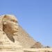 Great Sphinx of Giza in Cairo Egypt with pyramid in the background