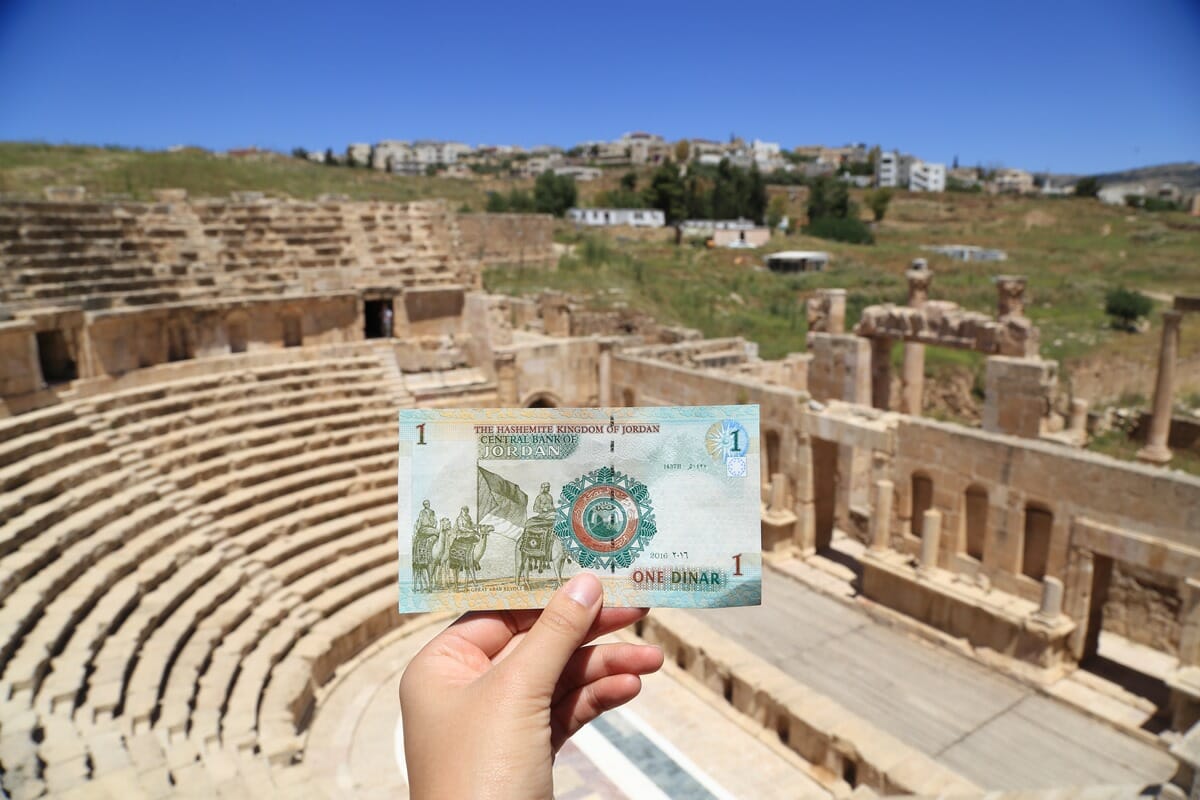 Jordanian Dinar in front of the north theatre in Jerash Jordan
