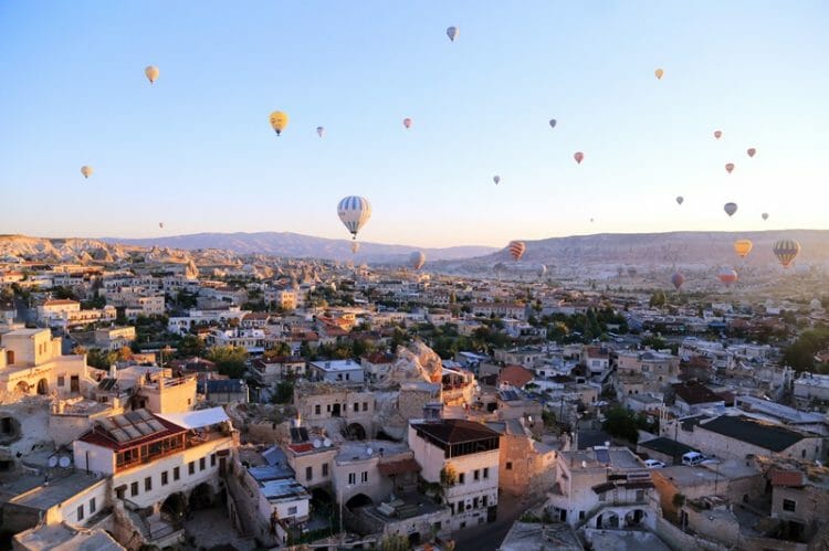 Hot air balloon above Goreme town in Cappadocia Turkey