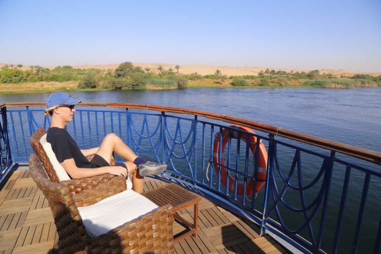 Nile cruise in Egypt sitting on top deck