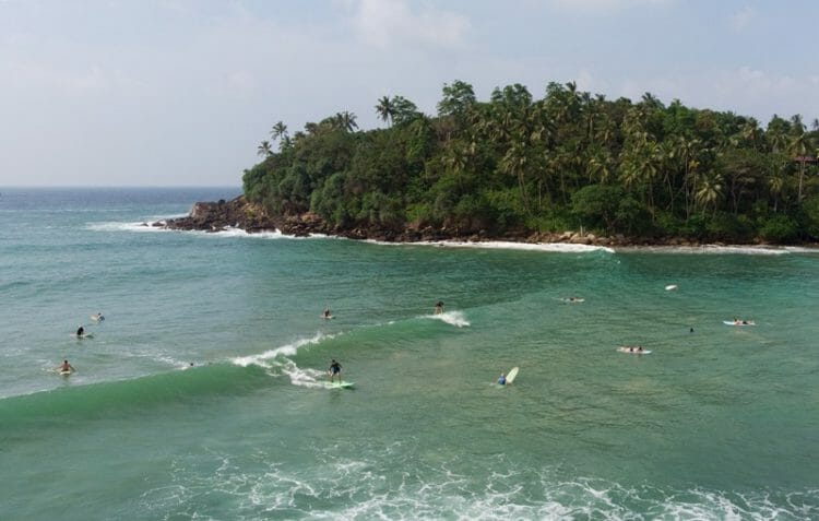 Surfing in Hiriketiya south Sri Lanka drone shot