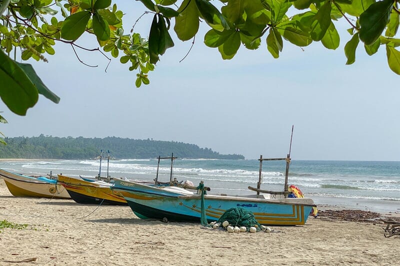Fishing boats on Mawella Beach in Sri Lanka