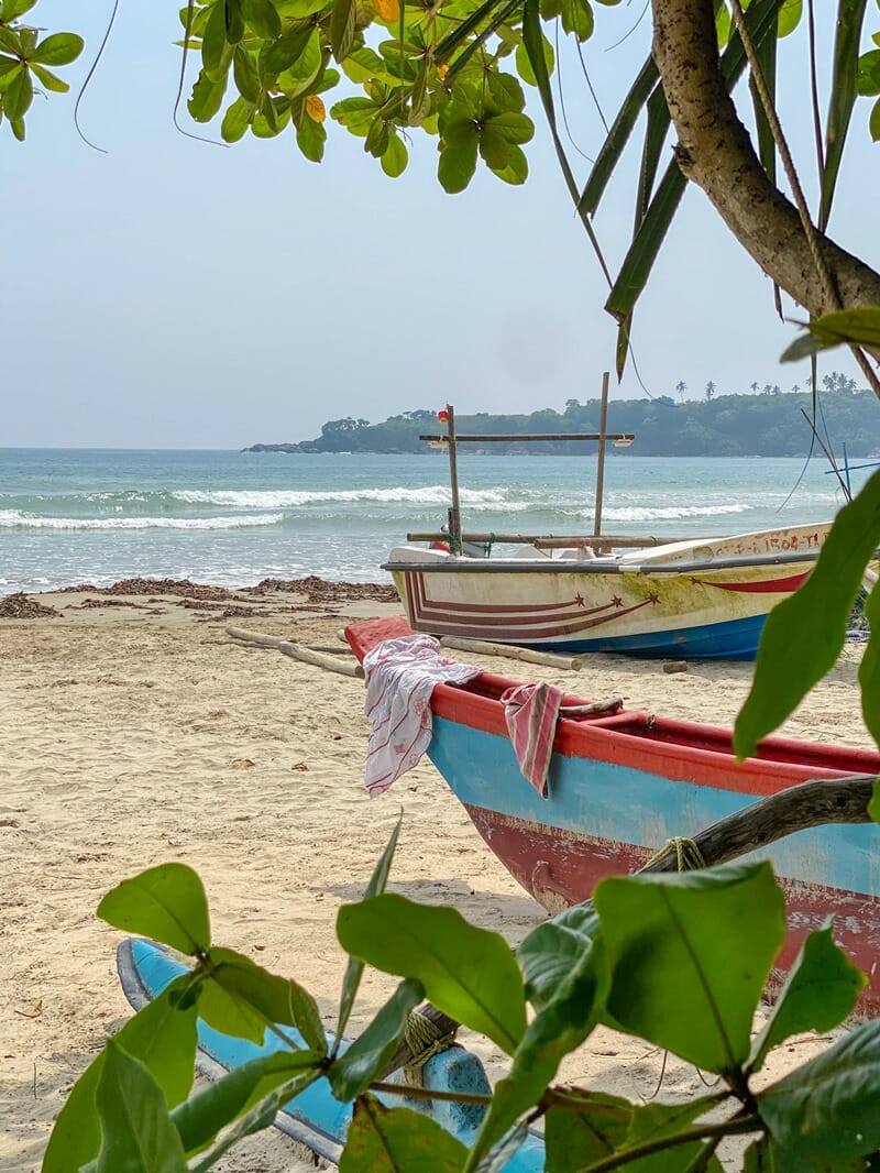 Fishing boats on Mawella Beach in Sri Lanka