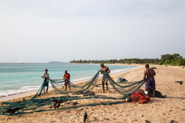 Fishermen at Nilaveli Beach in Trincomalee, Sri Lanka