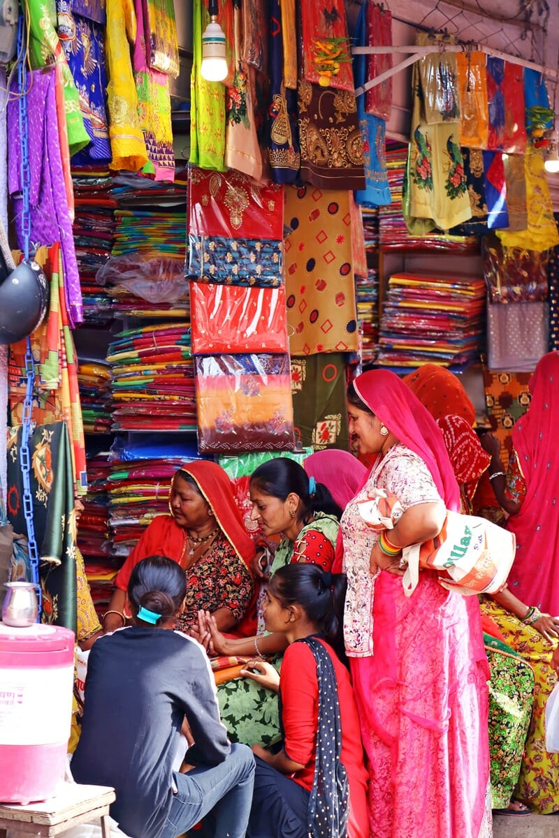 Women shopping for fabric at Sardar Market in Jodhpur India