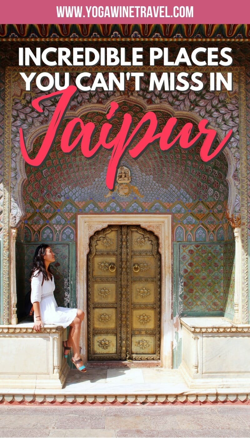 Woman sitting at palace gates in City Palace Jaipur India with text overlay