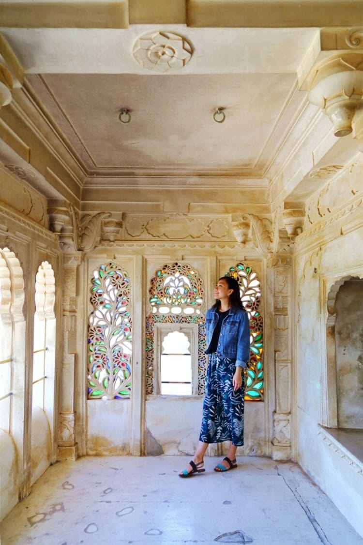 Woman standing in the City Palace in Udaipur India