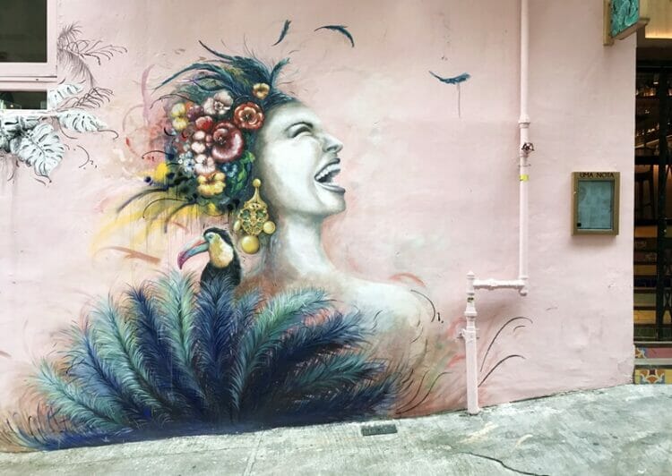 Laughing woman mural on Peel Street in Hong Kong