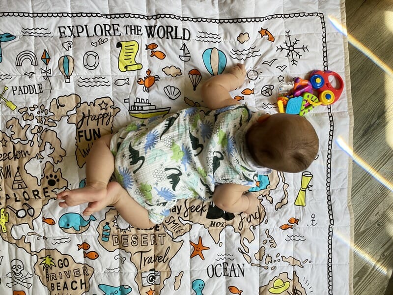 Baby on Explore the World playmat in Hong Kong