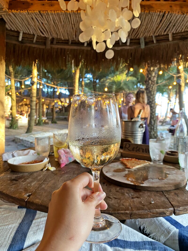 Glass of wine at sunset in Canggu Bali
