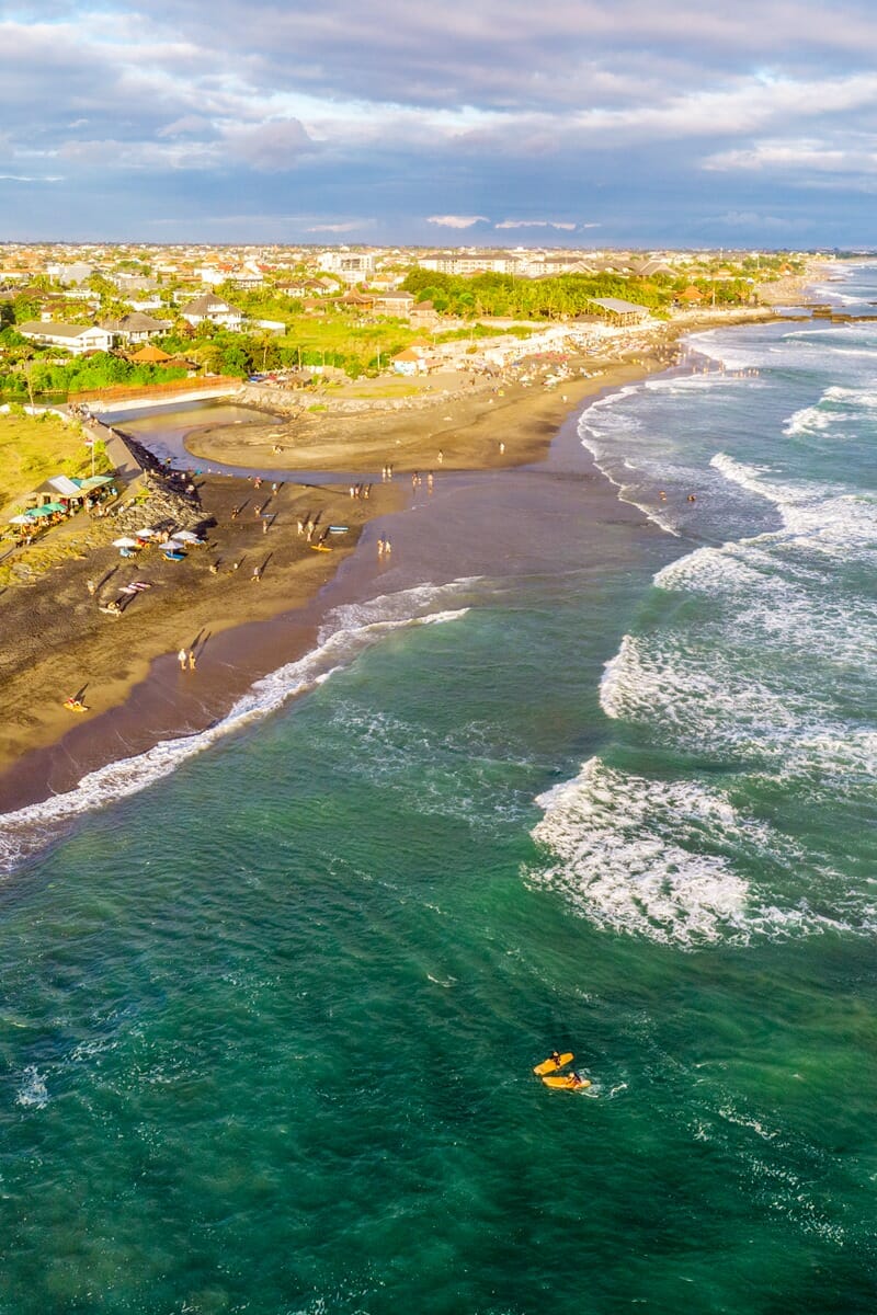 Surfers in Canggu Bali drone shot