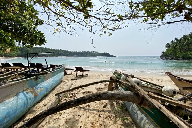 Fishing boats on Hiriketiya Beach in Sri Lanka