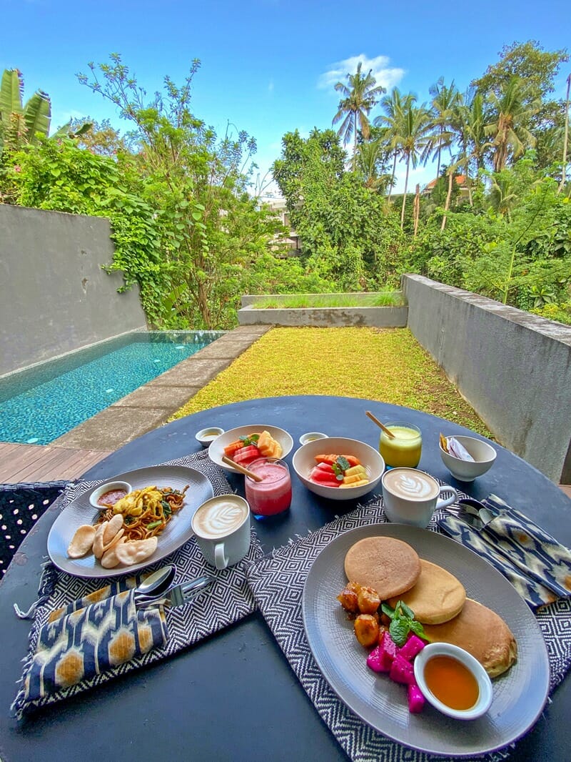 Poolside breakfast at Origin Ubud boutique hotel in Ubud Bali