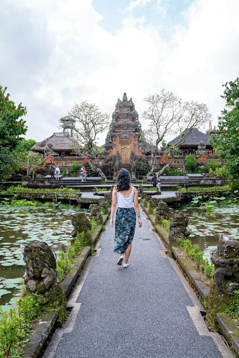 Woman walking at Saraswati Temple in Ubud Bali