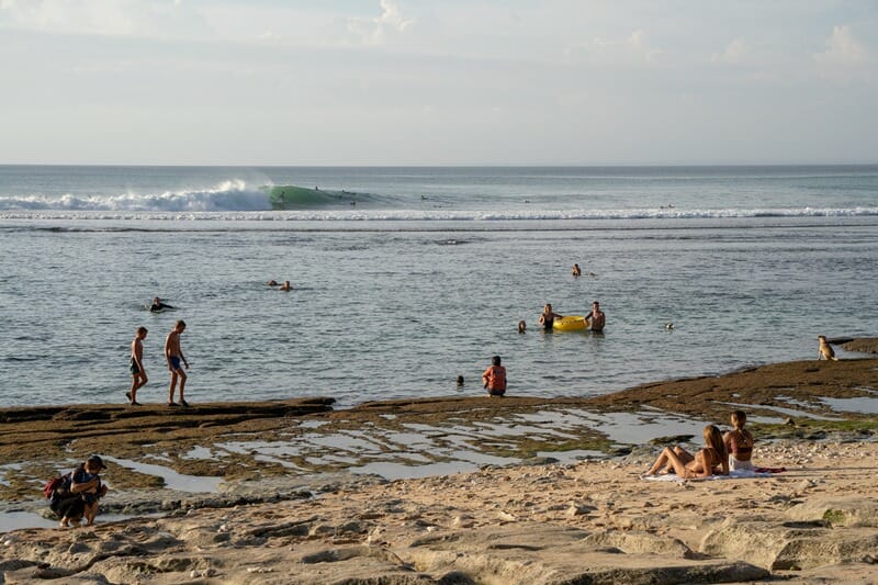 Surfers at Bingin Beach in Uluwatu Bali