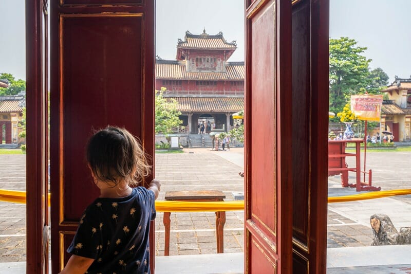 Toddler at To Mieu Temple in Hue Imperial Citadel in Vietnam