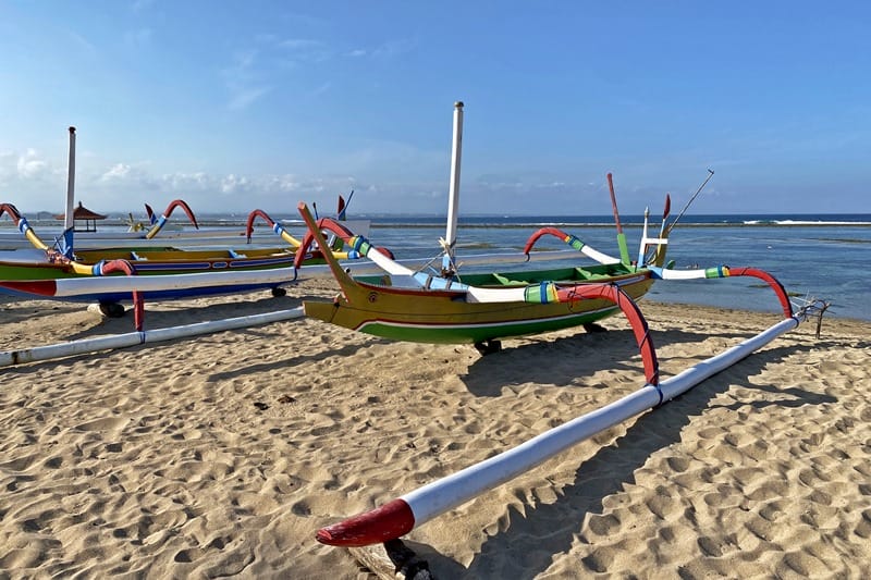 Fishing boats on Sanur Beach in Bali Indonesia