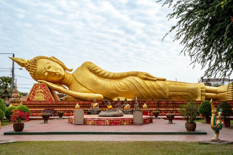 Reclining Buddha statue at Wat That Luang Tai in Vientiane Laos