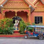 Tuk tuk at a temple in Vientiane Laos