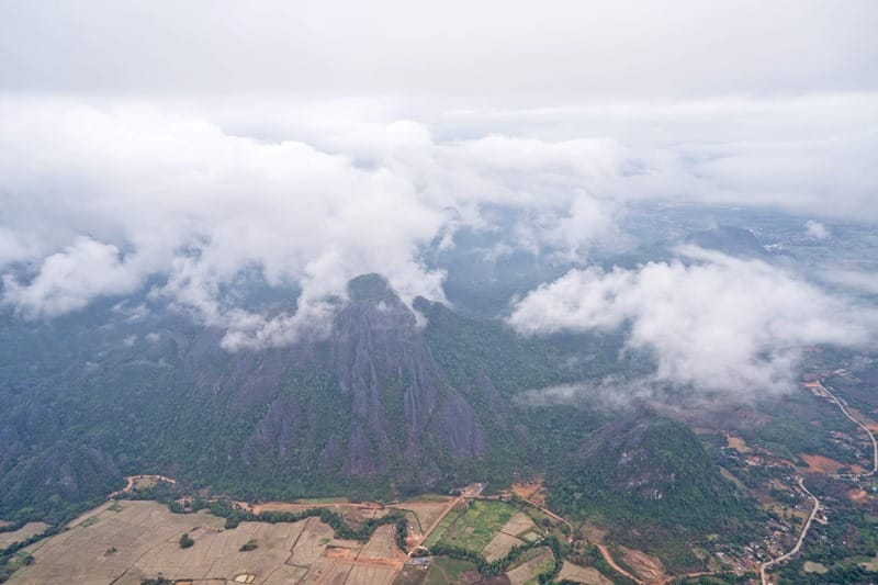Above the clouds in a Vang Vieng hot air balloon in Laos