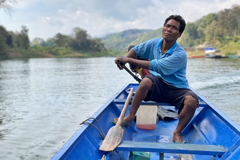 Longtail boat ride to Tad Sae Falls in Luang Prabang Laos