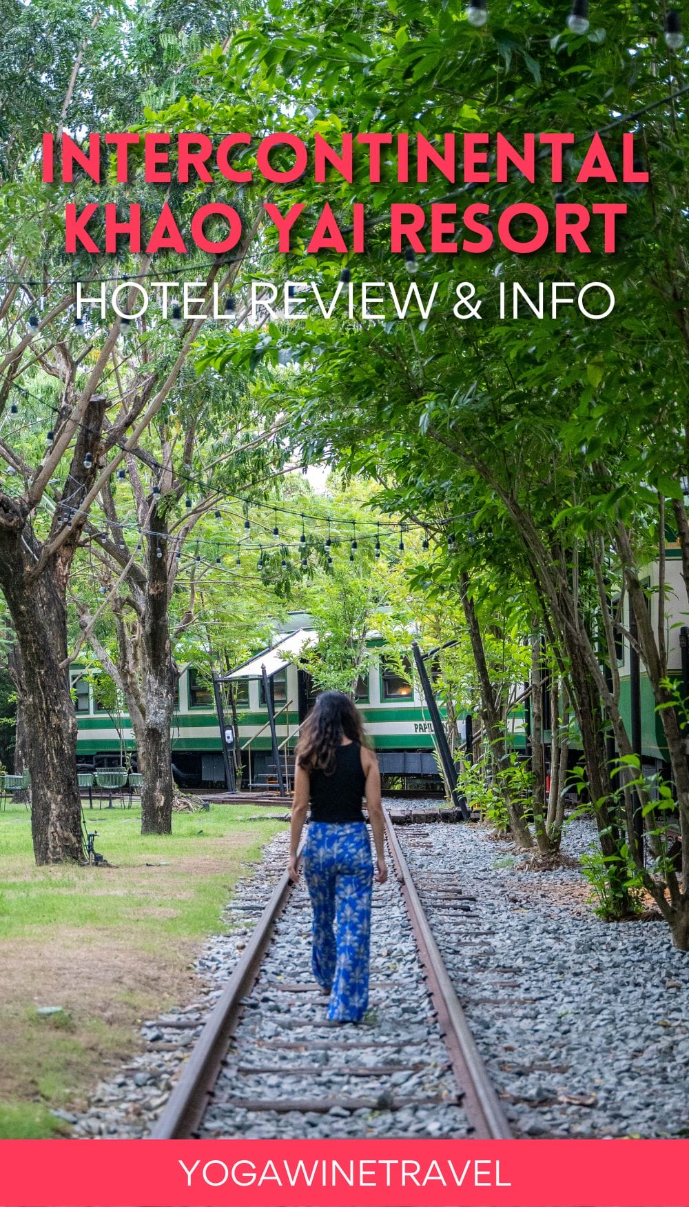 Woman walking along train tracks at InterContinental Khao Yai Resort in Thailand