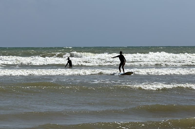 Beginners surfing in Khao Lak Thailand