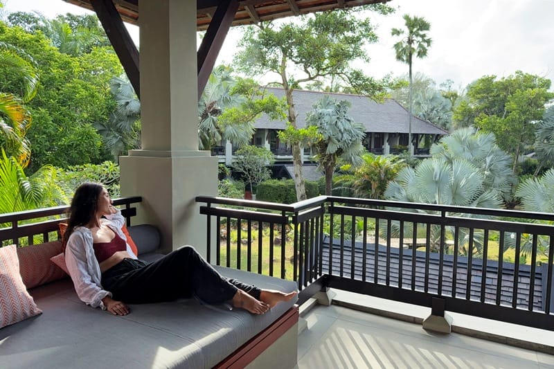 Lounging on daybed at The Slate Phuket in Thailand