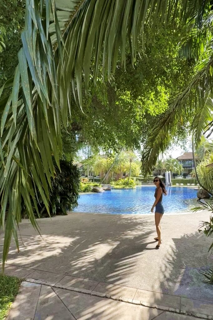 Walking next to the Lagoon pool at The Slate Phuket in Thailand