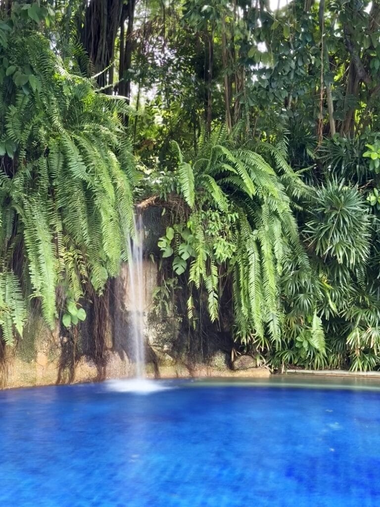Waterfall at the Lagoon pool at The Slate Phuket in Thailand