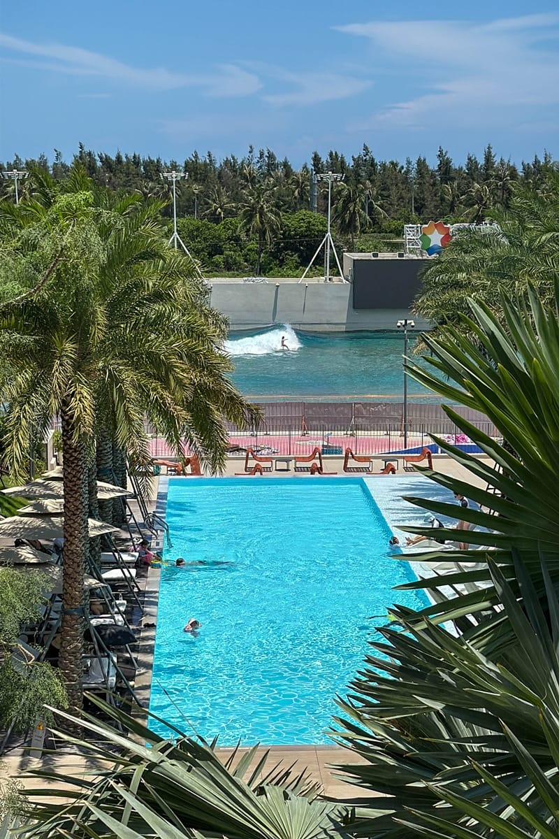 View of the Surfland wave pool from room at Uechao Hotel at Riyue Bay Surf Resort in Hainan China
