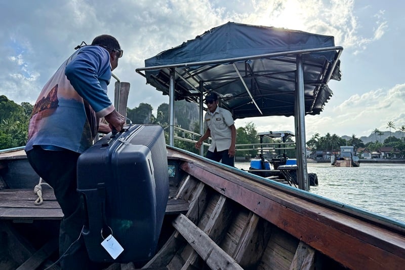 Luggage porters in Railay Thailand